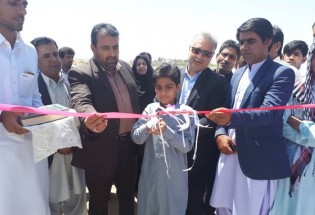 افتتاح زمین چمن مصنوعی روستای شکرآباد انده در شهرستان میرجاوه